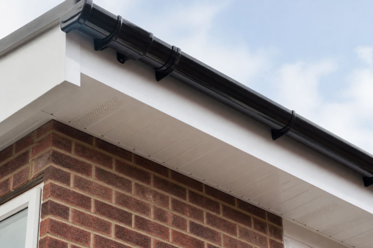 Example photograph of fascia, soffit and guttering at the eaves